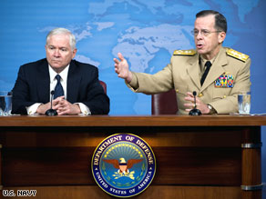 Adm. Mike Mullen, right, and Defense Secretary Robert Gates speak at the Pentagon on Wednesday.