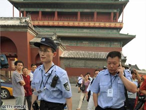 Chinese police are shown at the Drum Tower in Beijing last weekend.