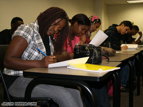 Students in a government course at Georgia Perimeter College examine the old and new citizenship tests.