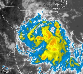 Cristobal churns off North Carolina coast