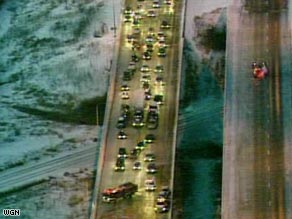 Traffic backs up Monday on a Chicago, Illinois-area highway after an early-morning accident.