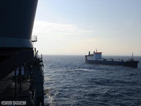 A U.S. Navy patrol monitors the MV Faina -- in the hands of pirates since September 25.