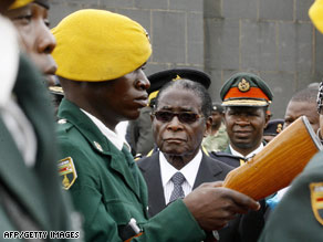 Zimbabwe President Robert Mugabe at Zanu-PF National Political Commissar Elliot Manyika's burial last week