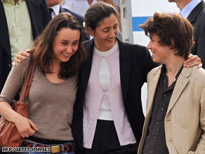 Betancourt, beside her mother, greets former hostage Clara Rojas on Wednesday.