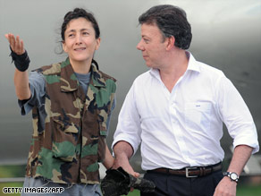 Former hostage Ingrid Betancourt with Colombian Defense Minister Juan Manuel Santos after her release.