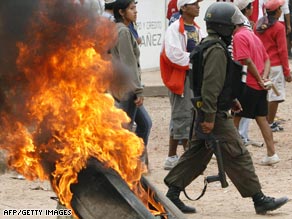 Members of Santa Cruz's Juvenile Union burn wood during protests Tuesday in Santa Cruz, Bolivia.