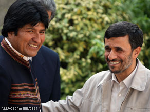 Iranian President Mahmoud Ahmadinejad, right, greets Bolivia's leader, Evo Morales, on Monday in Tehran.