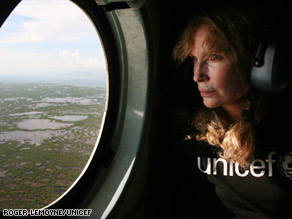 Mia Farrow views flooding in Haiti on a trip to the country devastated by a string of recent storms.