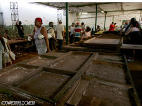 Vendors await the arrival of agricultural products at a green market in Havana, Cuba, on Thursday.
