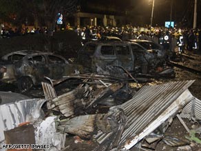 Firefighters at the scene of the crash Tuesday night in Mexico City.