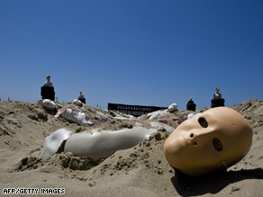 Protesters used dummies to represent victims of violence on Brazil's Copacabana beach this week.