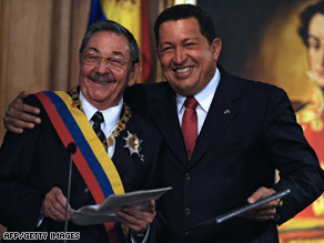 Venezuelan President Hugo Chavez embraces his Cuban counterpart, Raul Castro, over the weekend in Caracas.