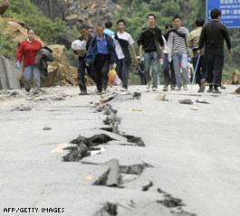 China: Troops rush to plug dam