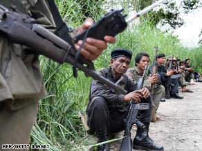 Cambodian soldiers stand guard near Preah Vihear temple, close to the Thai border.