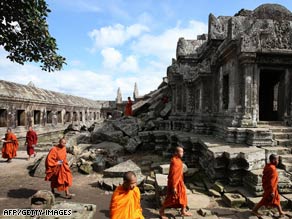 Cambodian Buddhist monks walk at Preah Vihear temple on Monday.