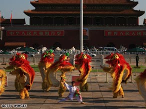 Dancers perform the traditional lion dance at Tiananmen Square in Beijing in early August.