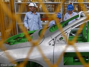 Workers at a factory for the Chery Automobile Co. in mid-July in Anhui province, China.