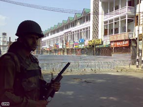 The city centre of Lal Chowk, sealed off by tin sheets and razor fitted wire by  Indian paramilitary forces Monday.