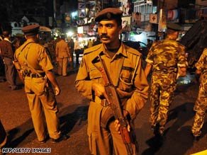 Police cordon off a street in Colombo on Monday following an explosion that injured at least 10.