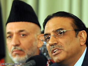 Afghanistan's Hamid Karzai, left, and Pakistan's Asif Ali Zardari have pledged to work together.