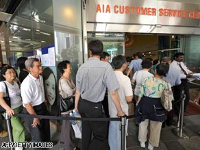 Customers crowd AIG subsidiary in Singapore - CNN.