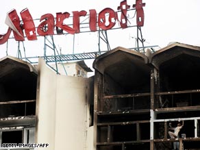 Cars wrecked in the blast at the Islamabad hotel.