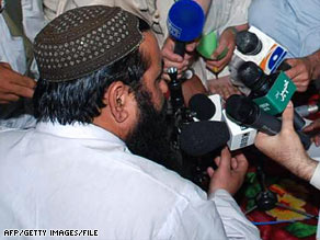 Baitullah Mehsud speaks to reporters in the tribal district of South Waziristan near the Afghan border in May.