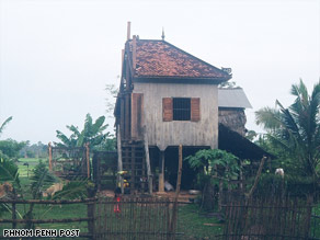 A couple who separated after 40 years of marriage split their house in two -- literally.