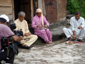 Kundar Singh Pundir, left, and his brother Amar, right, share Indira Devi, centre, as their wife.