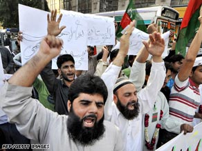 Activists shout slogans during an anti-US protest rally in Karachi on Thursday.