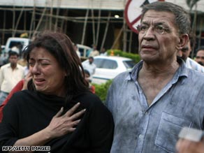 Two of the hostages freed after police stormed the Oberoi Hotel in Mumbai.