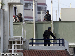 Two of the hostages freed after police stormed the Oberoi Hotel in Mumbai.