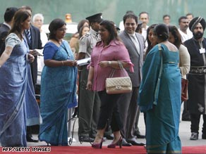 Guests arrive Sunday at the Taj Mahal Palace hotel in Mumbai.