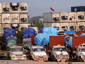 Containers bearing supplies for US-led forces and NATO in Afghanistan pass through Pakistan.