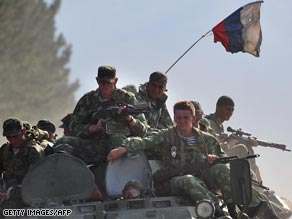 Russian soliders on patrol outside the Georgian city of Gori on Monday.