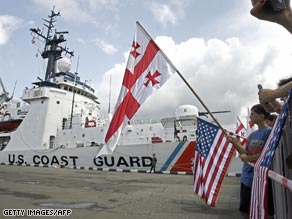 The first aid is unloaded from the Dallas in Georgia on Wednesday.