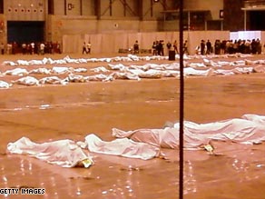 The victims of the crash were first laid out at a Madria convention center.