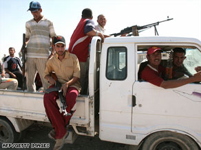 Former Iraq insurgents, pictured in 2007, in Anbar province have allied to oppose al Qaeda in Iraq.