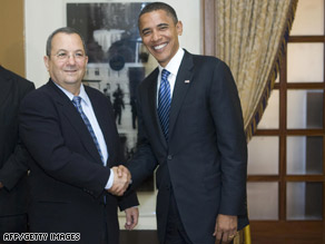U.S. Democrat presidential candidate Barack Obama, right, shakes hands with Israeli Defense Minister Ehud Barak in Jerusalem.