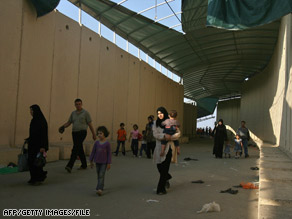Palestinian families leave Gaza through the Erez Crossing in 2007.