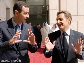 French President Nicolas Sarkozy (right) and Syria's President Bashar al-Assad