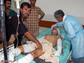 Saleh Bayati, 17 , is treated for injuries from Saturday's suicide bombing in Tal Afar.