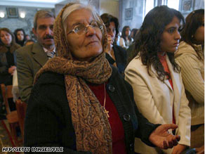Iraqi Christians attend Mass in Mosul last year where 13 Christians have been slain in the past two weeks.