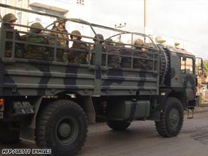 Turkish commandos ride in a military vehicle near the Iraqi border late last year.