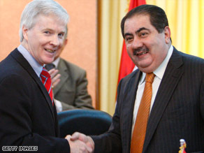 U.S. Ambassador Ryan Crocker, left, and Iraqi Foreign Minister Hoshyar Zebari attend Monday's signing event.