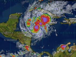 Hurricane Paloma was centered about 165 miles south of Grand Cayman Island Thursday evening.