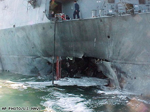 Damage sustained by the USS Cole after a bomb exploded on Oct. 2000.