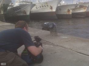 Neil Hallsworth shooting port of Kaohsiung, Taiwan, a hub for shark fins. The majority of the fins make their way from here to china, where they're eaten as a delicacy.