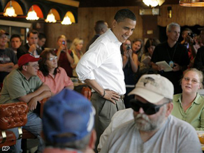 Sen. Barack Obama chats with diners at Bell Restaurant in Lebanon,Missouri.