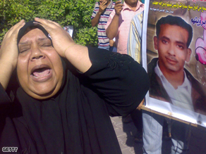 A mother screams following the verdict by an Egyptian court over the 2006 ferry accident in the port city of Safaga, 600km from the capital Cairo on Sunday.
